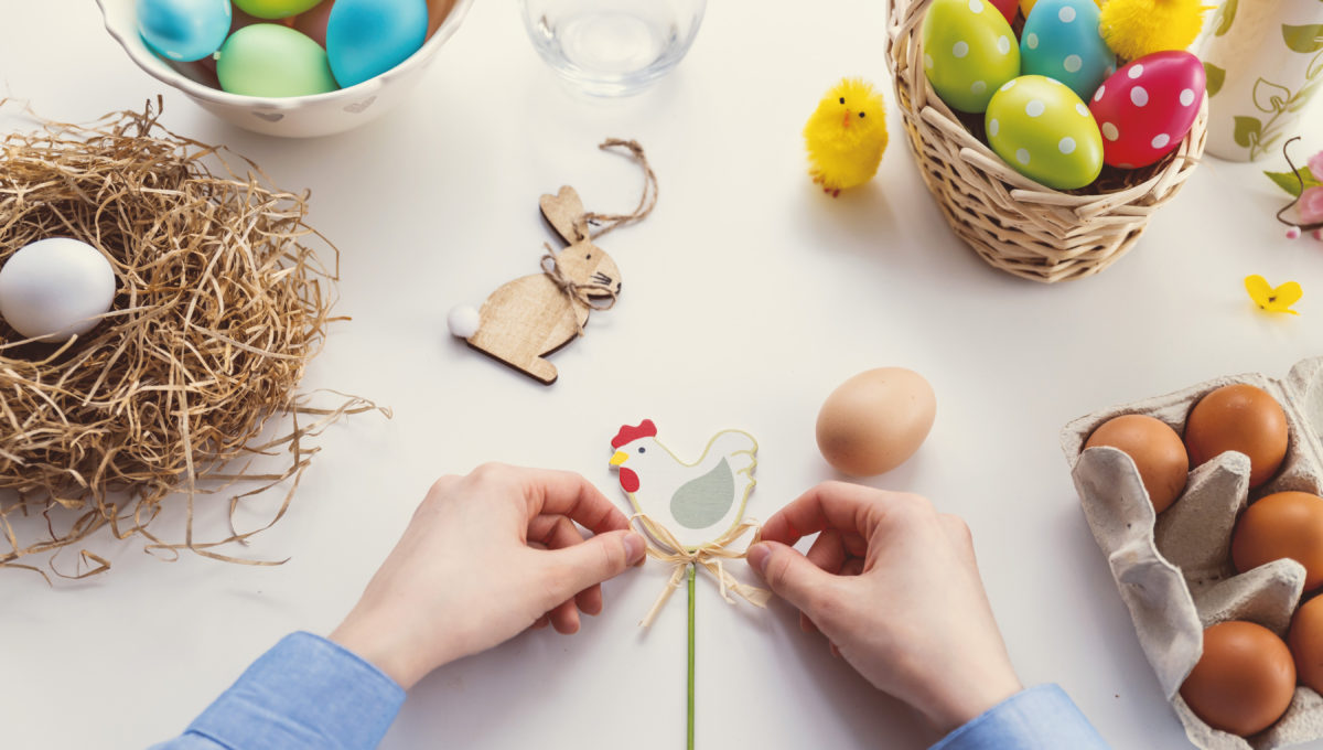 person-tying-knot-on-chicken-decor-1040161